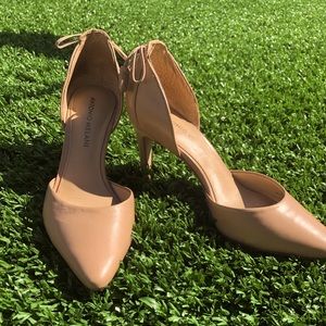 Antonio Melani pointed toe nude heels.